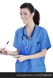 Smiling cute nurse making her medical notes over white background