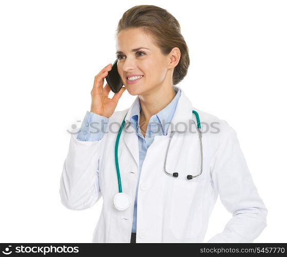Smiling doctor woman talking cell phone