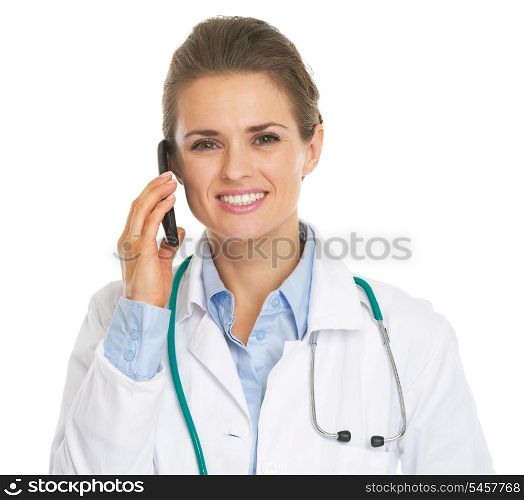 Smiling doctor woman talking mobile phone
