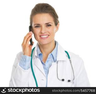 Smiling doctor woman talking mobile phone