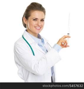 Smiling doctor woman with syringe