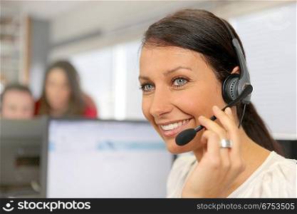Smiling employee with headset