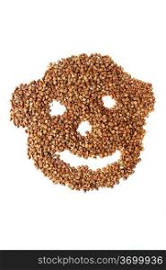 Smiling face made of backwheat isolated