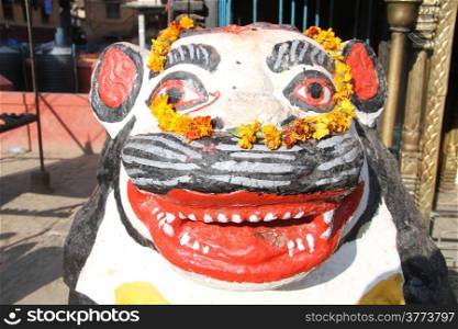 Smiling face of cow hindu god on the shrine