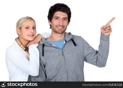 Smiling fair-haired woman and young man on white background