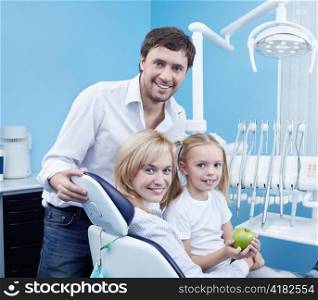 Smiling family in the dental office