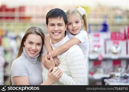 Smiling family in the store
