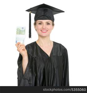 Smiling female graduation student showing pack of euros. HQ photo. Not oversharpened. Not oversaturated. Smiling female graduation student showing pack of euros isolated