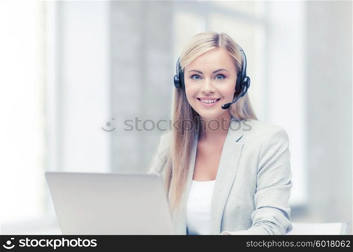 smiling female helpline operator with headphones and laptop. friendly female helpline operator with laptop