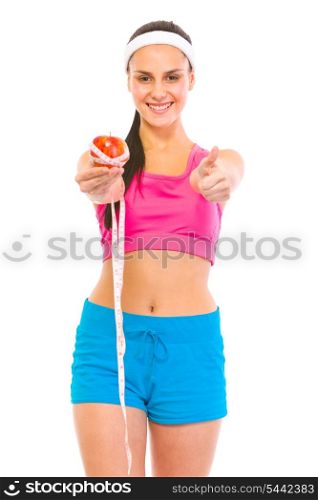 Smiling female holding apple with measuring tape and showing thumbs up &#xA;