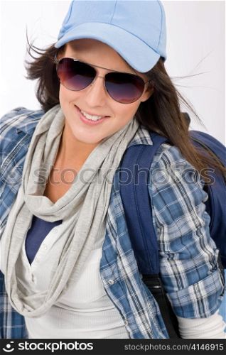 Smiling female teenager girl wear cool outfit and sunglasses