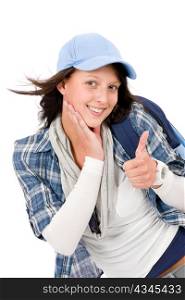 Smiling female teenager girl wear cool outfit thumb up