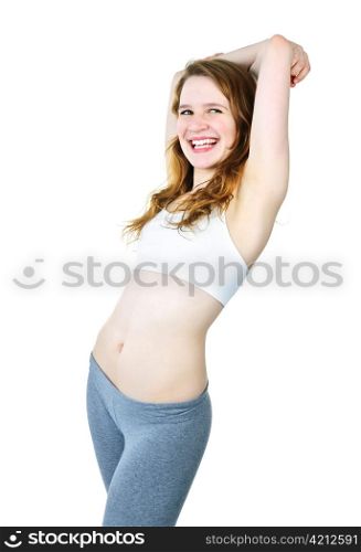 Smiling fit young woman standing isolated on white