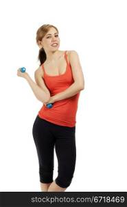 smiling fitness woman with dumbbells. young confident smiling fitness woman with dumbbells on white background