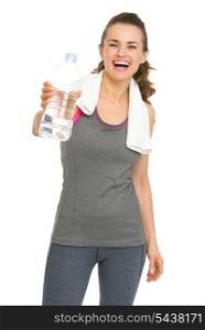 Smiling fitness young woman giving bottle of water