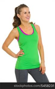 Smiling fitness young woman looking on copy space