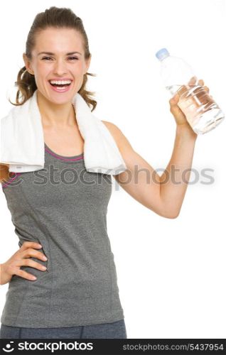 Smiling fitness young woman with bottle of water