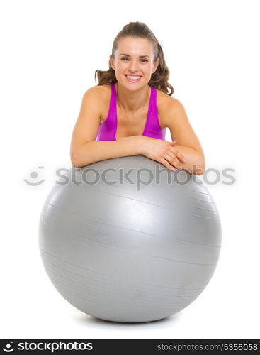 Smiling fitness young woman with fitness ball