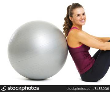 Smiling fitness young woman with fitness ball