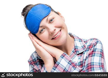 Smiling girl in pajamas ready for bed, portrait isolated