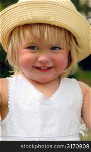 Smiling Girl in Straw Hat