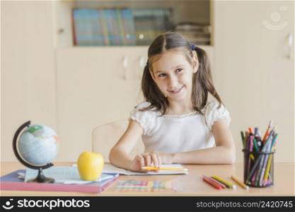 smiling girl looking away during lesson