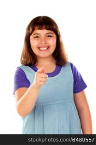 Smiling girl pointing at camera with her finger . Smiling girl pointing at camera with her finger isolated on a white background