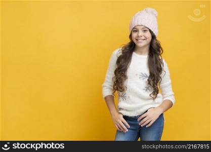 smiling girl sweater with snowflakes