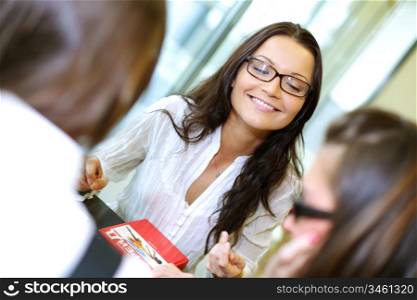 smiling girl thinking on examinination