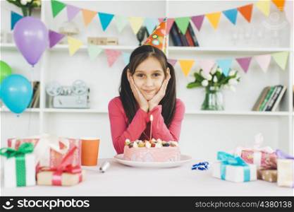 smiling girl with birthday cake