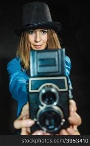 Smiling girl with camera, photography art and fashion concept