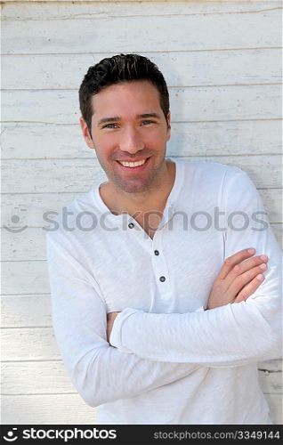 Smiling handsome man on white background