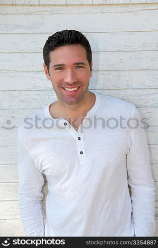 Smiling handsome man on white background