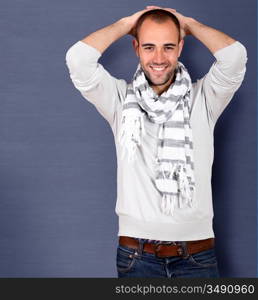 Smiling handsome man wearing scarf