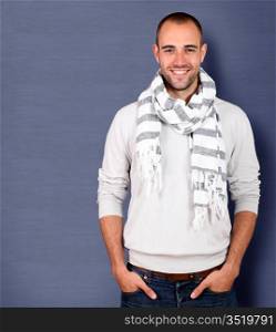 Smiling handsome man wearing scarf