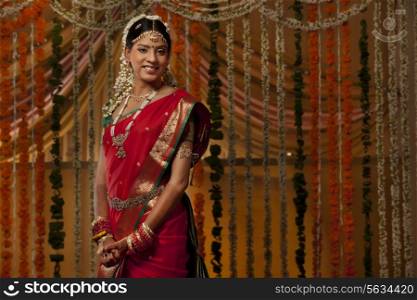 Smiling Indian bride looking away