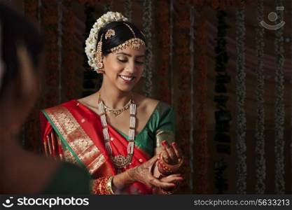 Smiling Indian woman wearing bangles