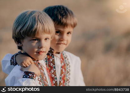 Smiling little ukrainian boys. Children together in traditional embroidery vyshyvanka shirts. Ukraine, brothers, freedom, national costume, win in war.. Little ukrainian boys. Children in traditional embroidery vyshyvanka shirts.
