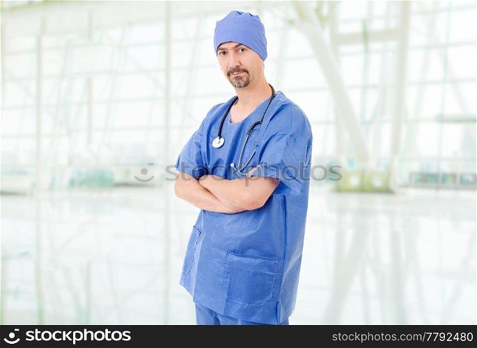 Smiling male doctor at the hospital