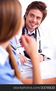 Smiling male doctor looking the side cornor on isolated white background