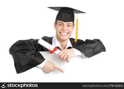 Smiling male graduate holding a sign at the white background