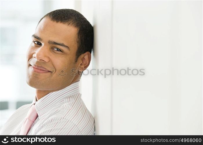 Smiling male office worker