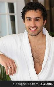 Smiling man in bathrobe