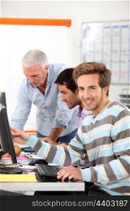 Smiling man in computing training