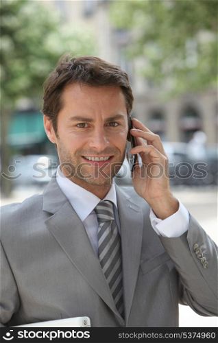Smiling man on phone