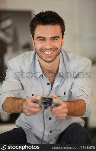 Smiling man playing games