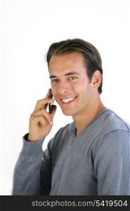 Smiling man talking on his mobile phone