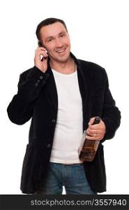 Smiling man with a phone and bottle of scotch. Isolated