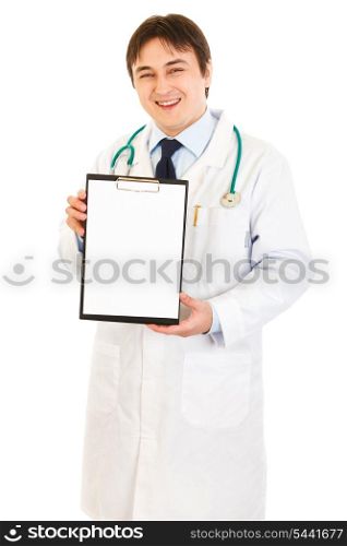 Smiling medical doctor holding blank clipboard isolated on white&#xA;