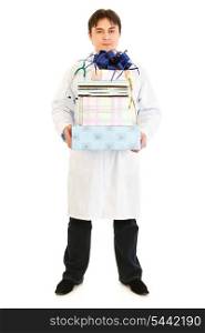 Smiling medical doctor holding gifts in hands isolated on white&#xA;